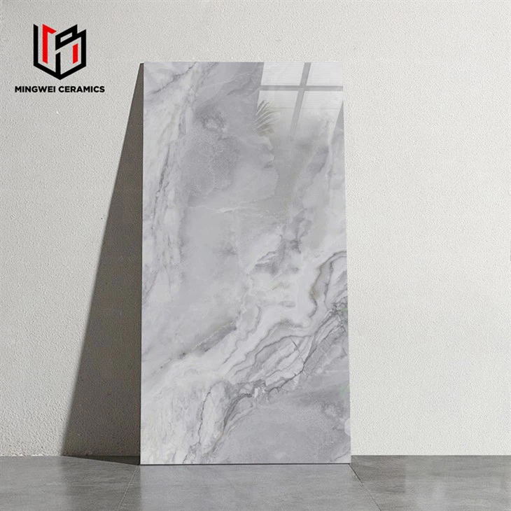 Tīra pelēka spīdīga keramikas flīze